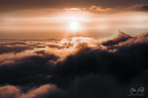 Ecuador Sunset above clouds