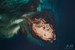 Aerial Island from above at coast Machallilla